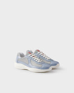 Sneakers Prada America's Cup en cuir verni et tissu technique